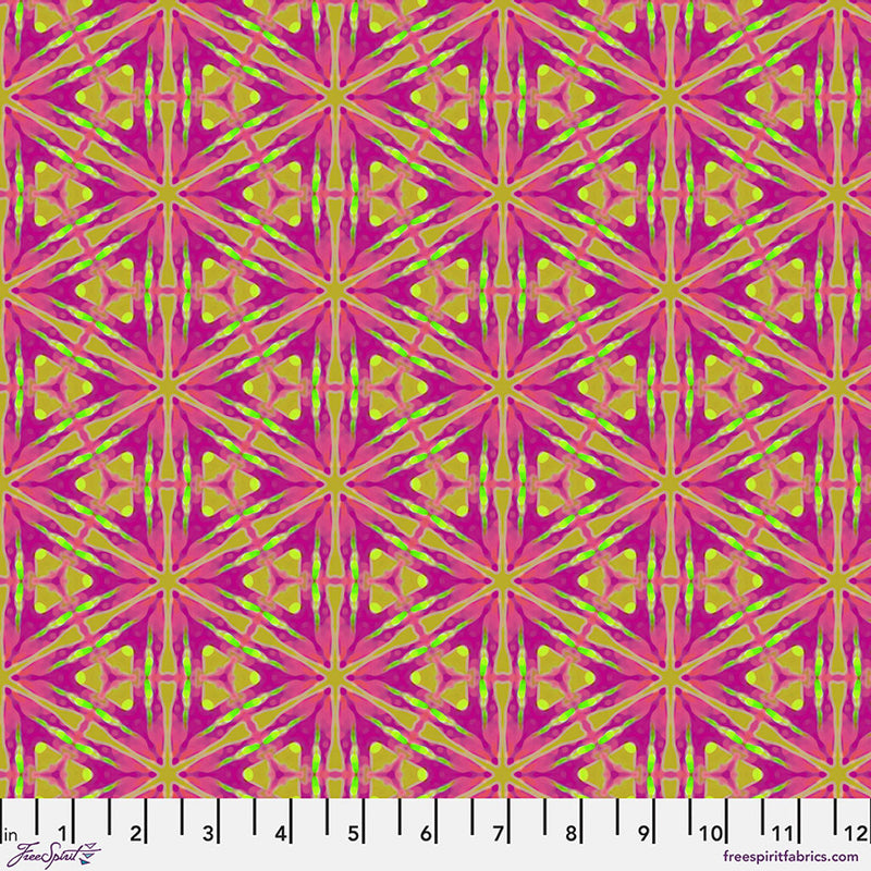 A geometric honeycomb pattern printed on a cotton quilting fabric with a cm ruler