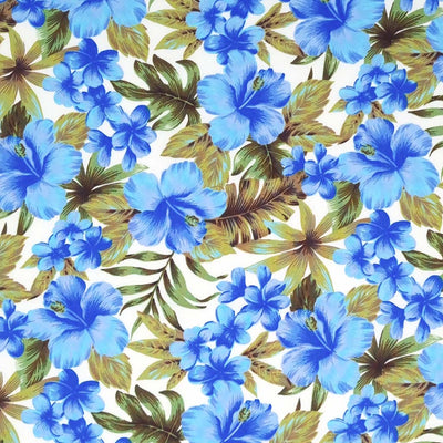 Tropical blue flowers printed on an ivory cotton poplin fabric