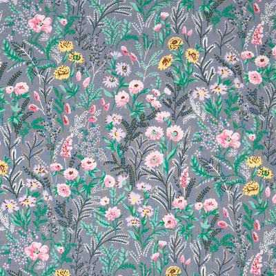 A garden of beautiful flowers printed on a silvery grey cotton poplin fabric