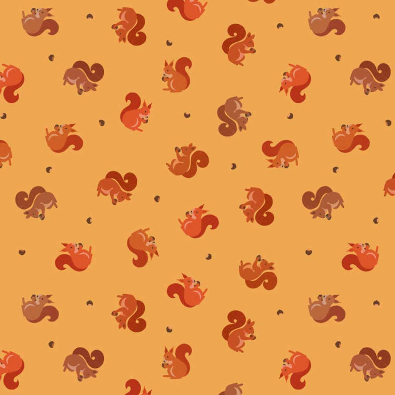 Pattern of cartoon squirrels on a yellow cotton quilting fabric