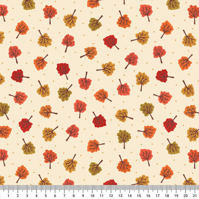 Pattern of autumn leaves on a beige background with a ruler at the bottom.