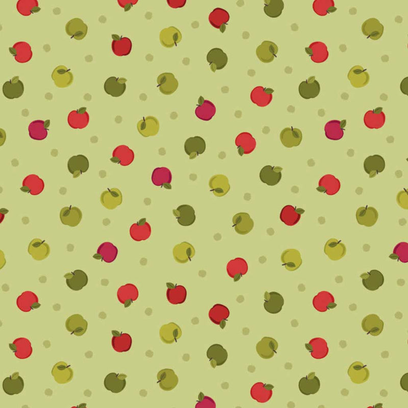 Pattern of red and green apples on a light green cotton quilting fabric with small dots.