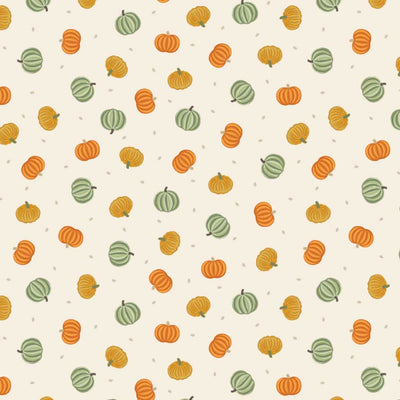 Pattern of pumpkins and gourds on a beige cotton quilting fabric