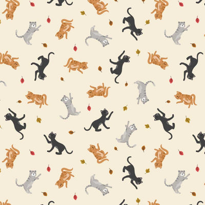 Pattern of colourful cats on a beige cotton quilting fabric