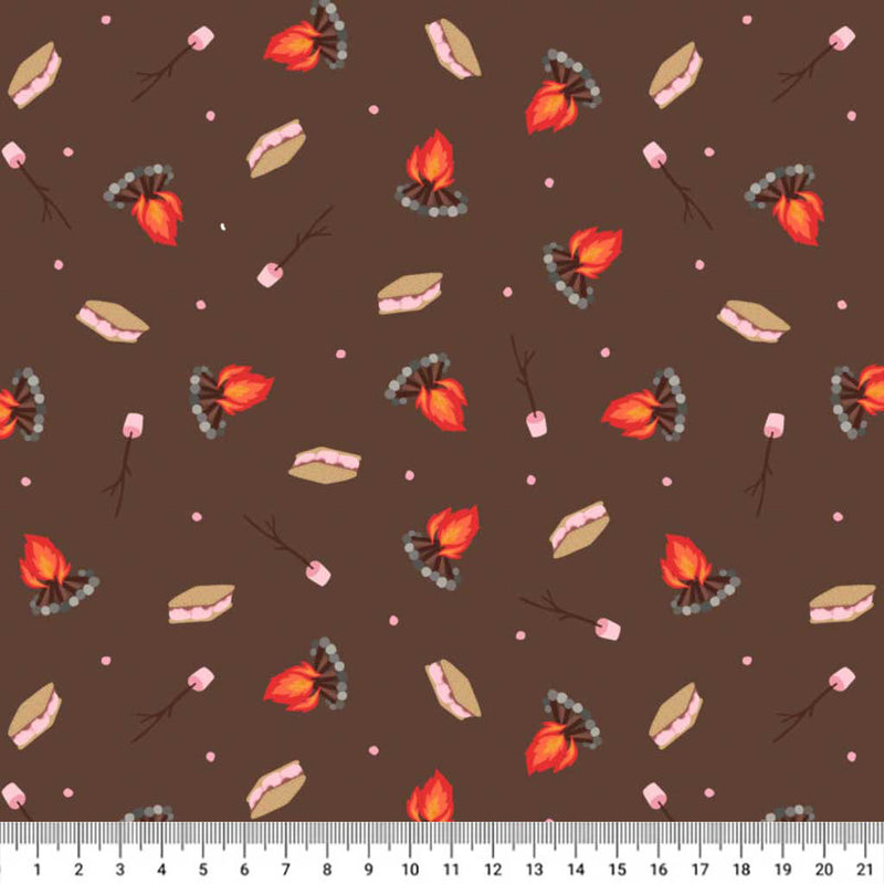 Pattern of campfire, marshmallows, and leaves on a brown cotton quilting fabric with a ruler at the bottom.