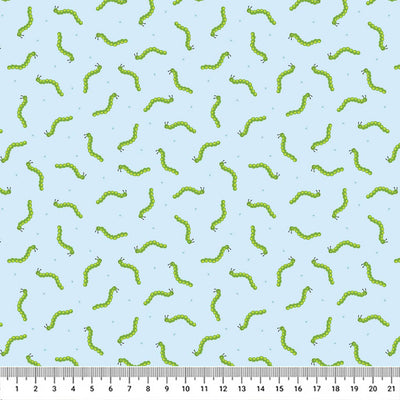 Bright green caterpillars wriggling along a beautiful blue 100% cotton fabric with a cm ruler