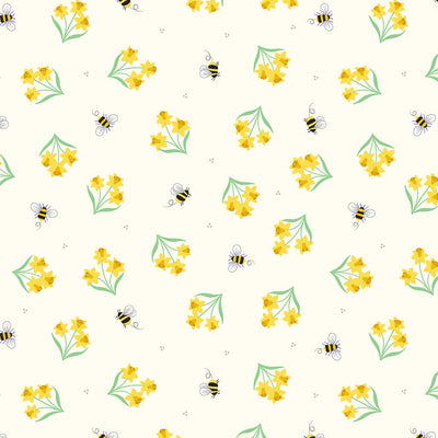 Vibrant mini daffodils surrounded by buzzing bees on a light pastel yellow 100% cotton fabric