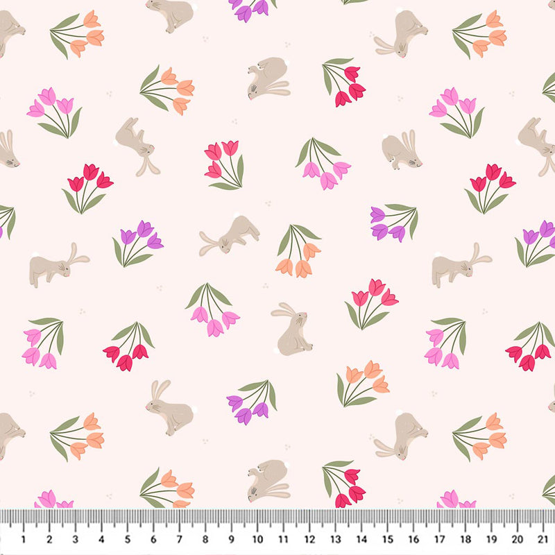 Tulip bunches in pinks and purples scattered around grey bunnies on a cream 100% cotton fabric with a cm ruler