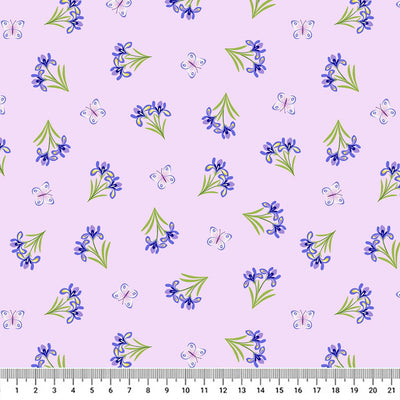 Blue and white butterflies fluttering around delicate blue irises on an 100% cotton fabric with a cm ruler