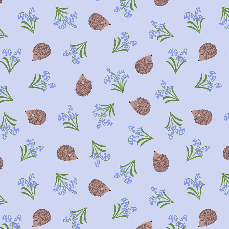 Small hedgehogs scattering along blooming bluebells on a baby blue 100% cotton fabric