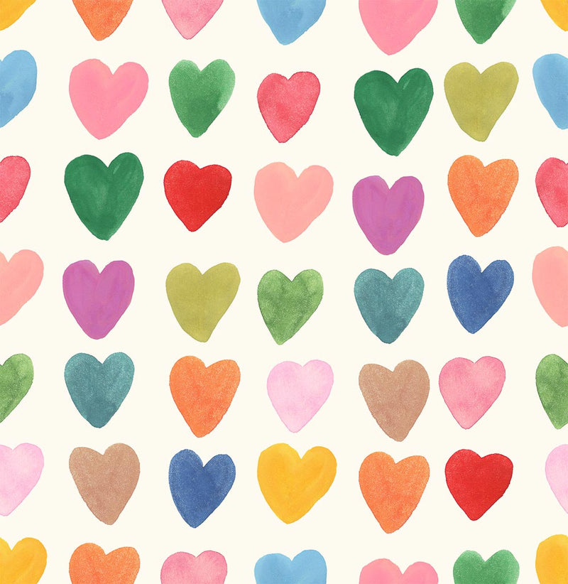 Large colourful heart printed on a cream cotton quilting fabric by Lewis & Irene