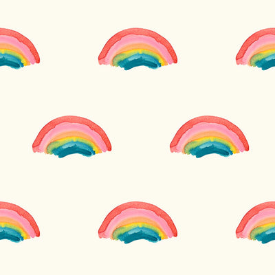 Rainbows printed on a cream quilting fabric by Lewis & Irene