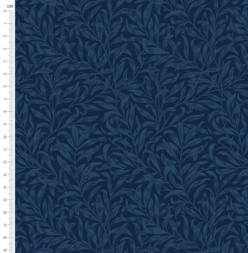 Navy blue willow bough design printed on quilting cotton fabric with a cm ruler