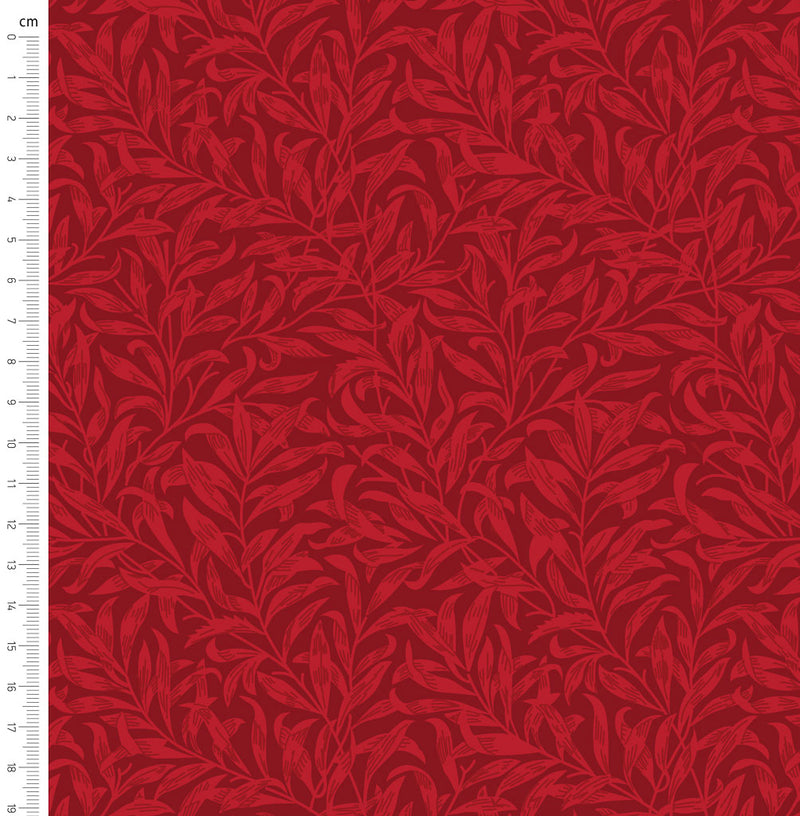 Cherry red willow bough design printed on quilting fabric with a cm ruler