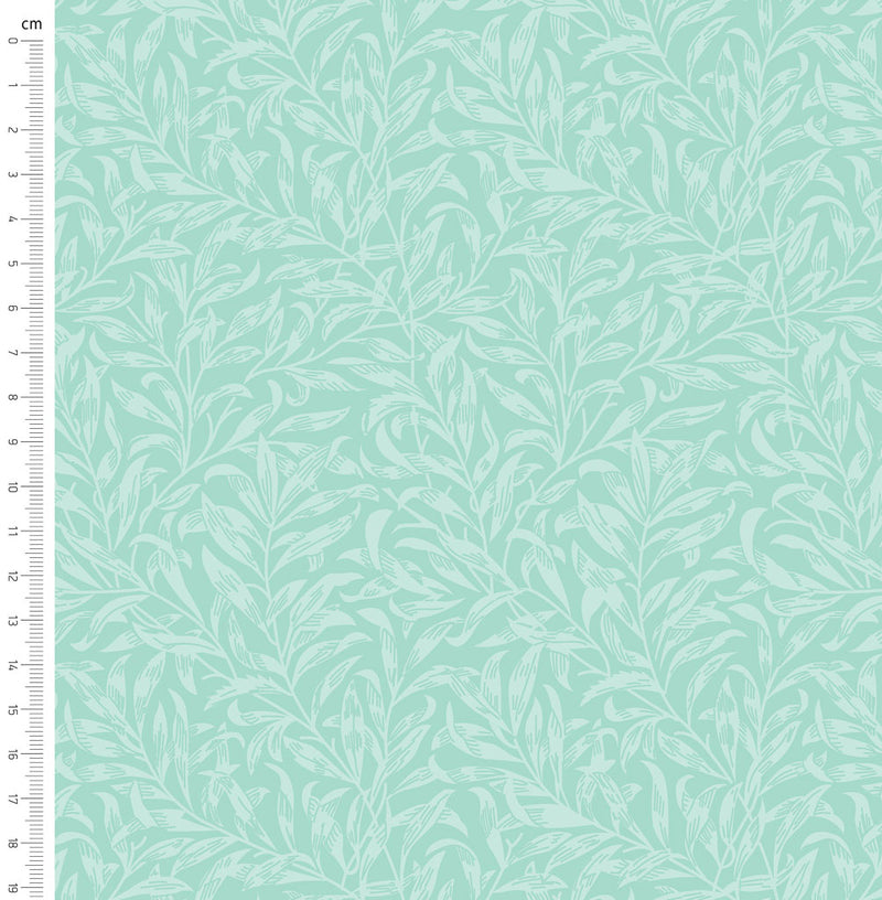 Seafoam green willow bough design printed on quilting fabric with a cm ruler