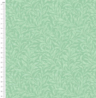 Sage green willow bough design printed on quilting fabric with a cm ruler