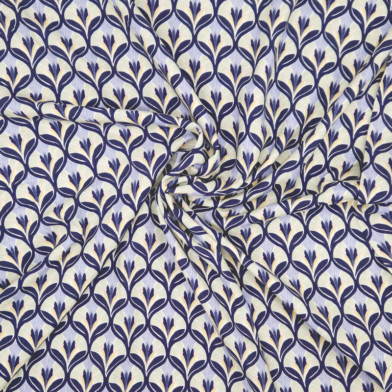 Patterned fabric with blue floral design on a light viscose fabric