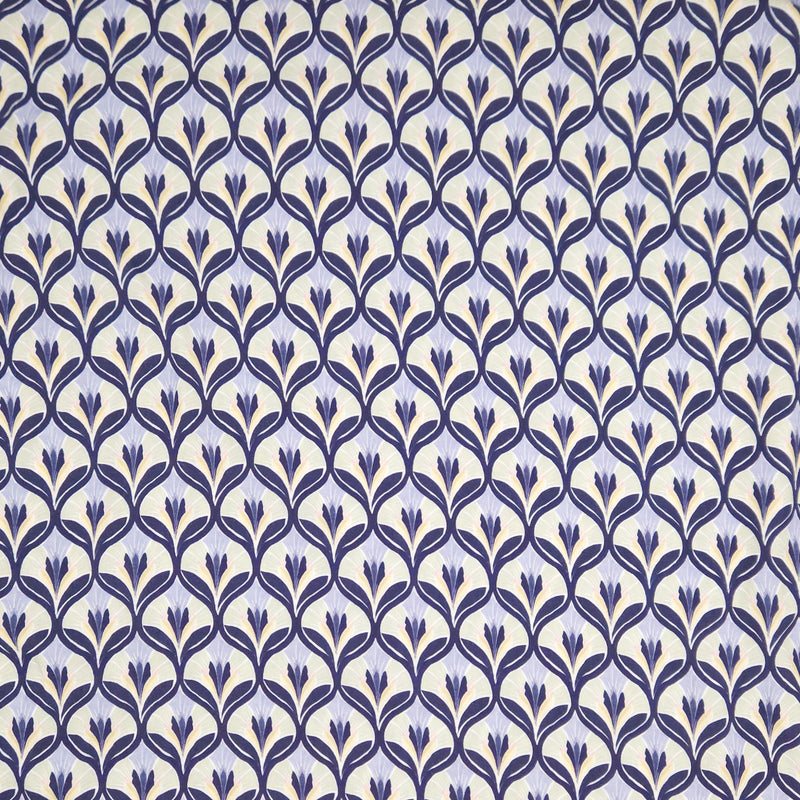 Patterned fabric with blue floral design on a light viscose fabric