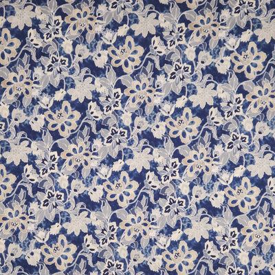 Floral pattern with white flowers on a blue pima cotton lawn fabric