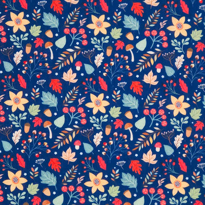 Colorful floral and leaf pattern on a blue polycotton fabric