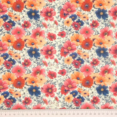 Pattern of colorful flowers on a cream polycotton fabric with a cm ruler