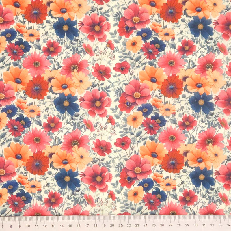Pattern of colorful flowers on a cream polycotton fabric with a cm ruler