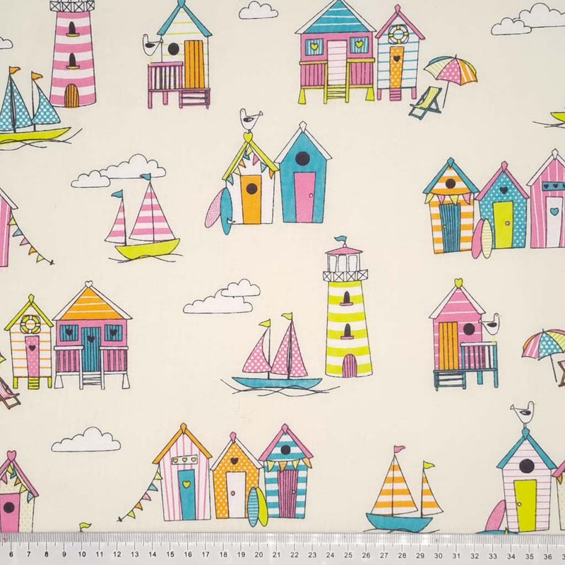 Colourful beach huts in a gorgeous tutti frutti colourway are printed on an ivory, 100% cotton fabric with a cm ruler