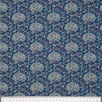 Floral patterned pima cotton lawn fabric with a ruler at the bottom for scale.