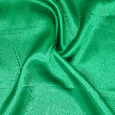 An emerald green budget satin fabric