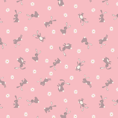 Easter bunnies printed on a pink cotton fabric
