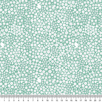 Mini bunnies and ditsy flowers are printed on a spring green 100% premium quilting cotton with a cm ruler