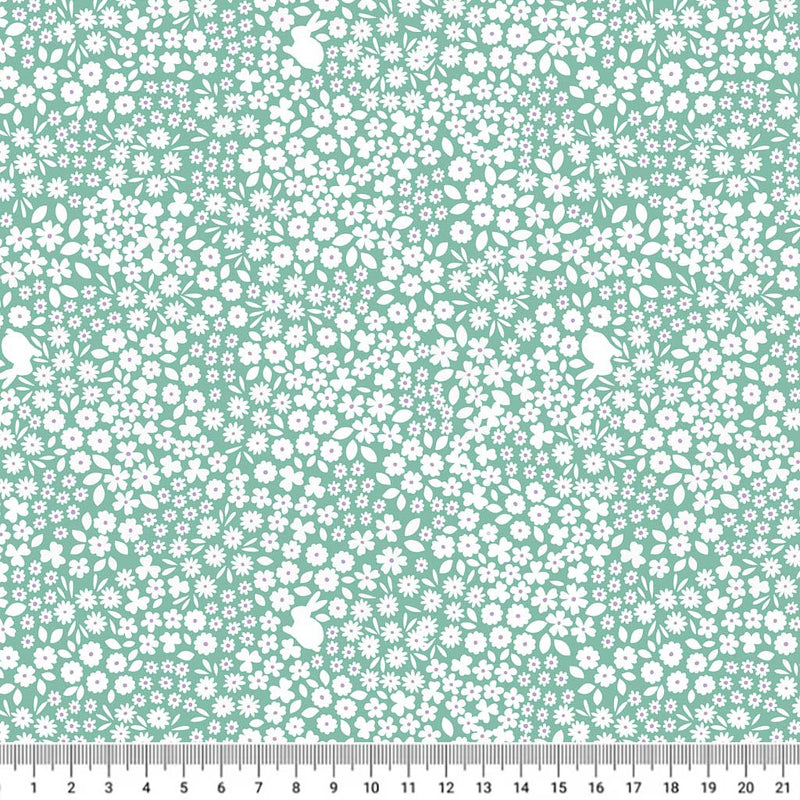 Mini bunnies and ditsy flowers are printed on a spring green 100% premium quilting cotton with a cm ruler
