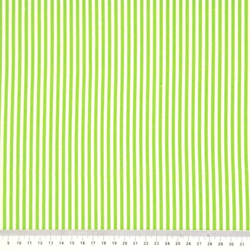 Apple green candy stripes printed on a quality white 100% cotton fabric with a cm ruler