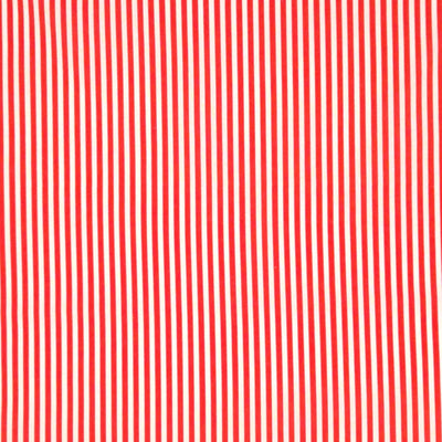 Red candy stripes printed on a white cotton fabric