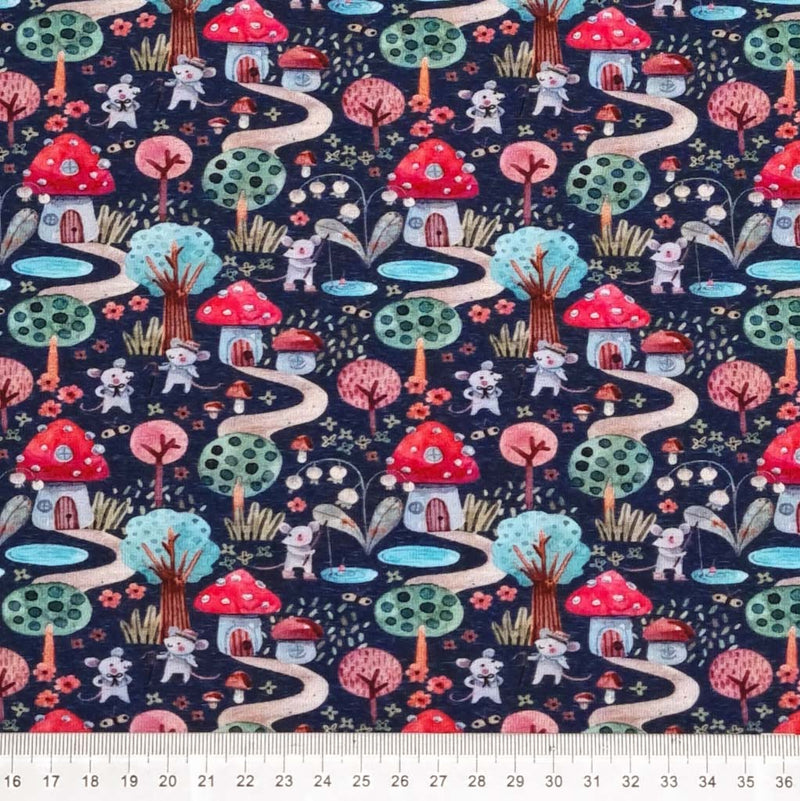 Toadstool houses with cute little mice are printed on a navy cotton jersey fabric with a cm ruler