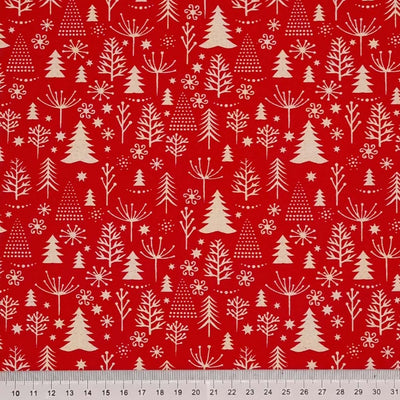 Christmas trees printed on a red natural fabric