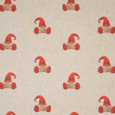 Little gonks in red hats are printed on a panama craft fabric