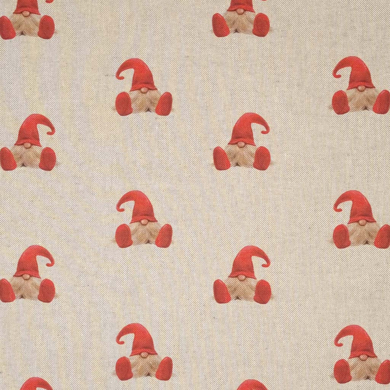 Little gonks in red hats are printed on a panama craft fabric