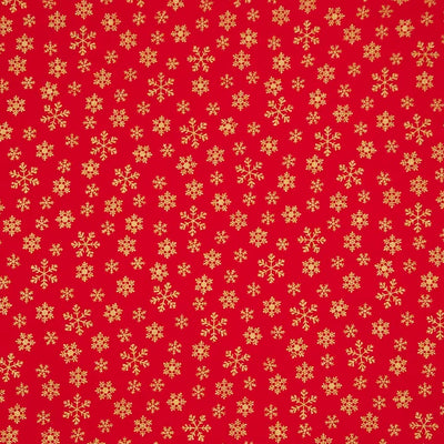 Red cotton fabric with gold snowflake pattern
