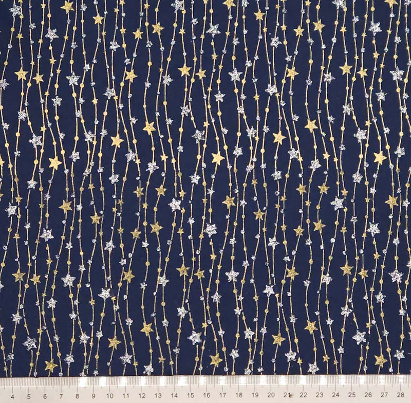 Navy blue fabric with gold and silver star pattern