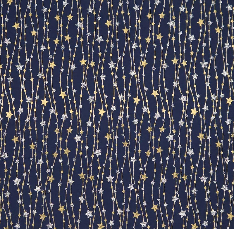 Pattern of stars and string lights on a dark blue cotton fabric