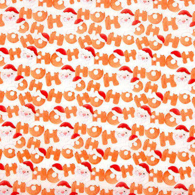 Ho Ho Ho and Santa faces printed on a white christmas polycotton fabric