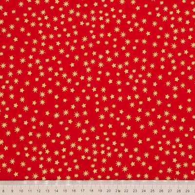 Red fabric with small yellow star patterns