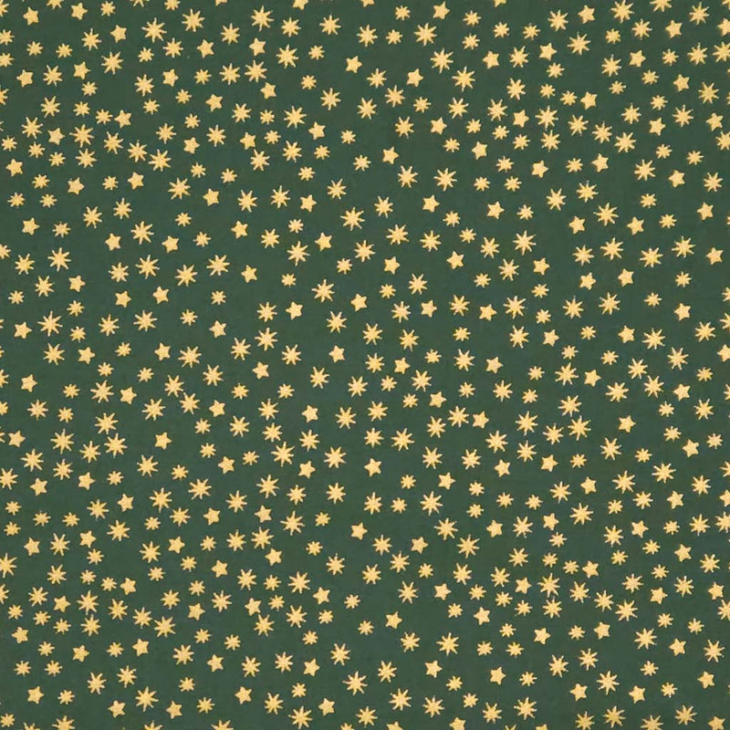 Pattern of small gold stars on a green cotton fabric