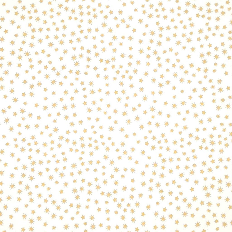 Pattern of small gold stars on a cream cotton fabric