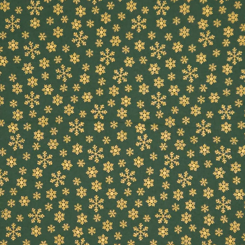 Pattern of gold snowflakes on a green cotton fabric