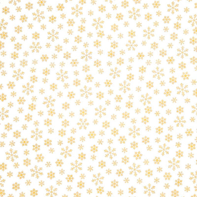 Pattern of gold snowflakes on a cream cotton fabric