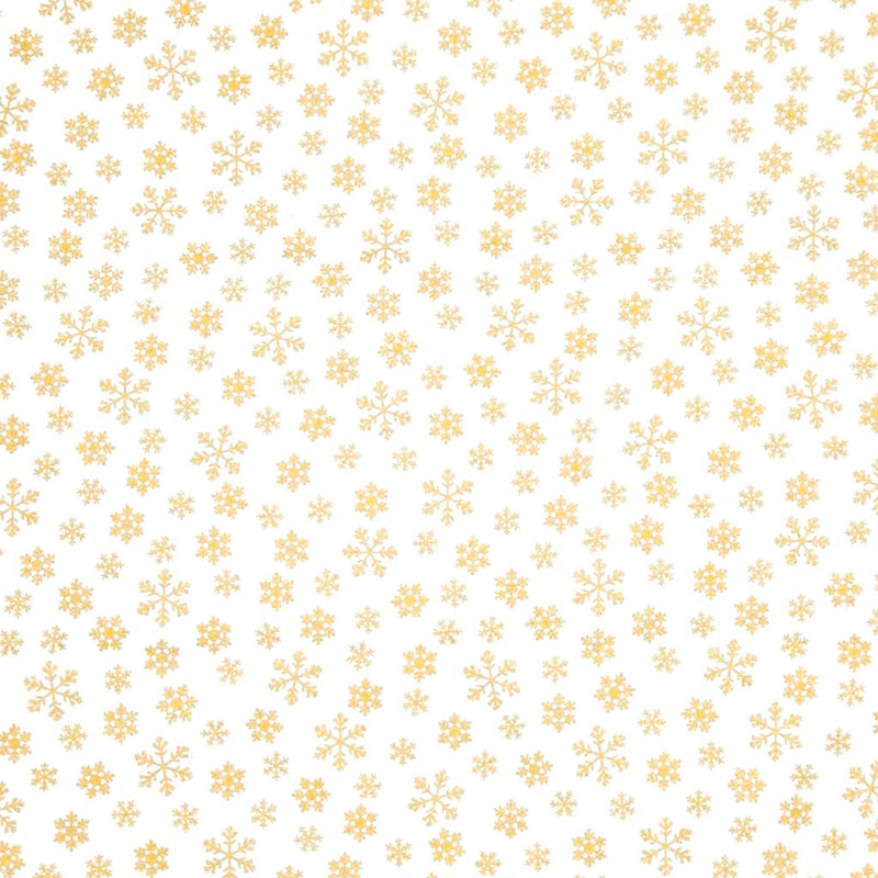 Pattern of gold snowflakes on a cream cotton fabric