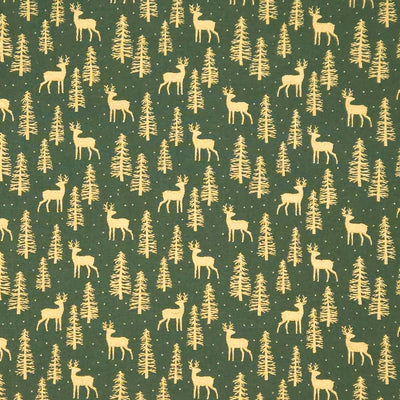 Pattern of deer and trees on a green cotton fabric