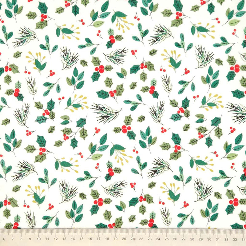 Festive fabric pattern with green leaves, red berries, and pinecones on a white background.